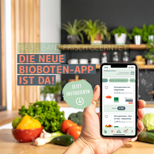 KI generiert: Person hält Smartphone mit Bioboten-App, Gemüse im Hintergrund. Text: "DIE NEUE BIOBOTEN-APP IST DA! JETZT INSTALLIEREN".