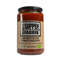 KI generiert: Hauptinhalt: Glas mit aromatischer Tomatensuppe. Text: "SUPPE! FABRIK AROMATISCHE TOMATENSUPPE".