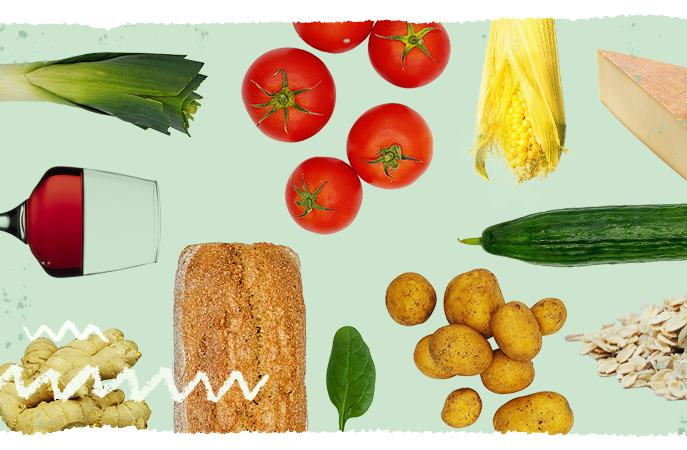 KI generiert: Verschiedene Lebensmittel wie Lauch, Tomaten, Brot, Wein, Gurke und Käse auf grünem Hintergrund.